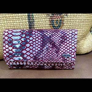 Arietti All leather imitation grey snake wallet with red trim. Great condition.